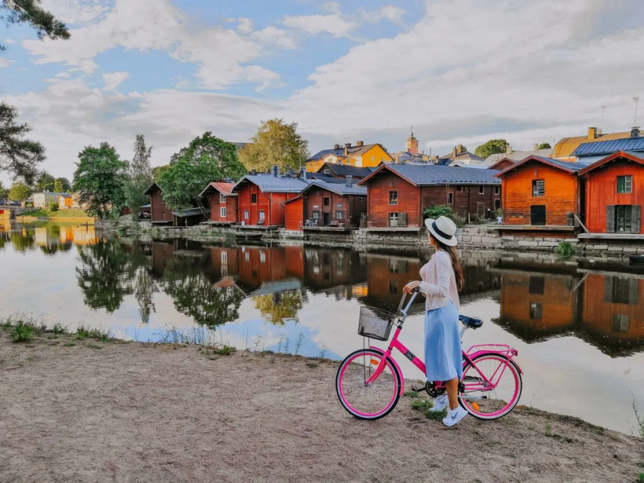 Cyclist along the Porvoo River in sumertime